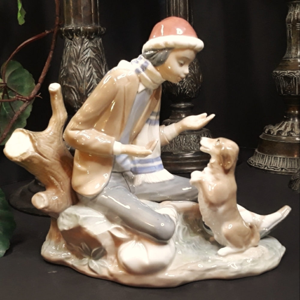 Glossy NAO by Lladro fine porcelain figurine titled "Lesson for the Dog", #140